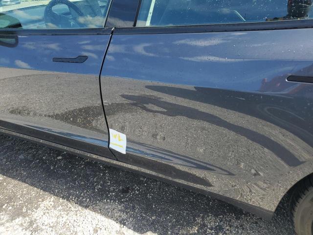 Photo 12 from auction – 2023 TESLA MODEL 3 with VIN 5YJ3E1EA8PF561452