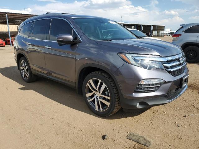 Photo 4 from auction – 2018 HONDA PILOT TOUR with VIN 5FNYF6H96JB069558