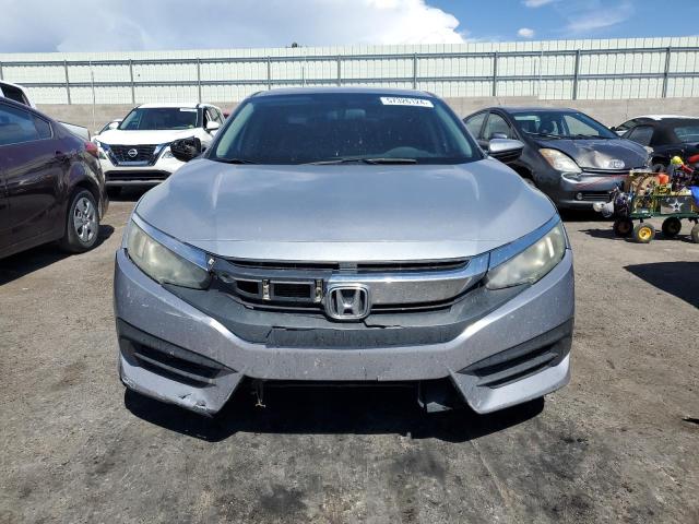 Photo 5 from auction – 2016 HONDA CIVIC LX with VIN 19XFC2F59GE016957
