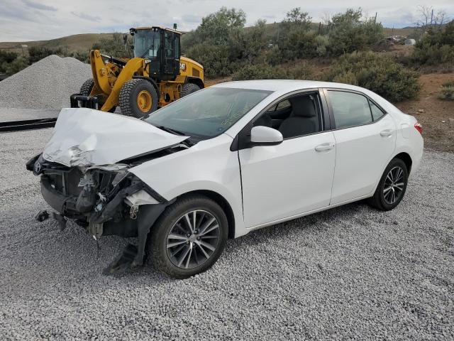 TOYOTA COROLLA L 2016 with VIN 5YFBURHE5GP496463 - Photo from auction