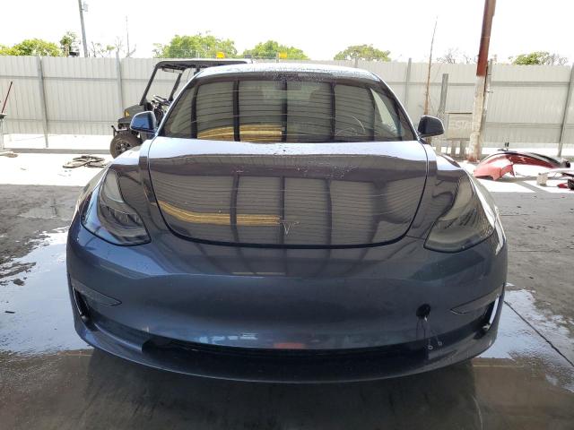 Photo 5 from auction – 2022 TESLA MODEL 3 with VIN 5YJ3E1EC2NF113299