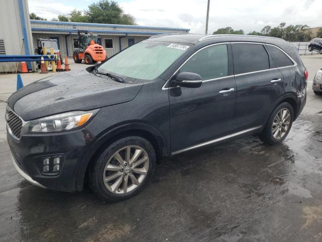 KIA SORENTO SX 2016 with VIN 5XYPK4A55GG056028 - Photo from auction