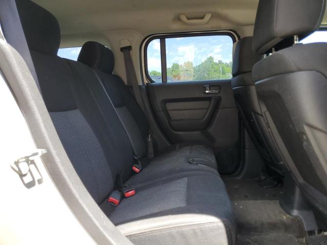 Photo 11 from auction – 2006 HUMMER H3 with VIN 5GTDN136668296315