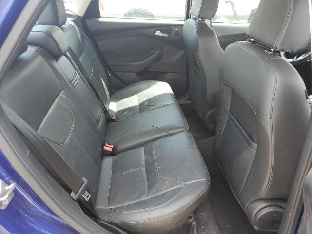 Photo 10 from auction – 2015 FORD FOCUS TITA with VIN 1FADP3J22FL382897