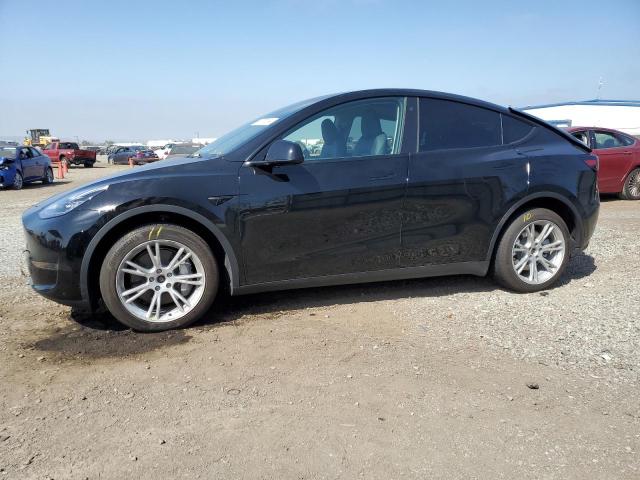 TESLA MODEL Y 2023 with VIN 7SAYGDEE0PA090336 - Photo from auction