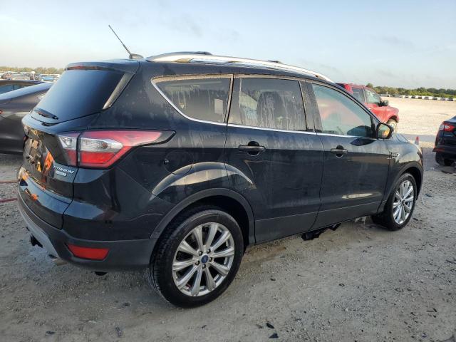 Photo 3 from auction – 2017 FORD ESCAPE TIT with VIN 1FMCU0J9XHUE28690