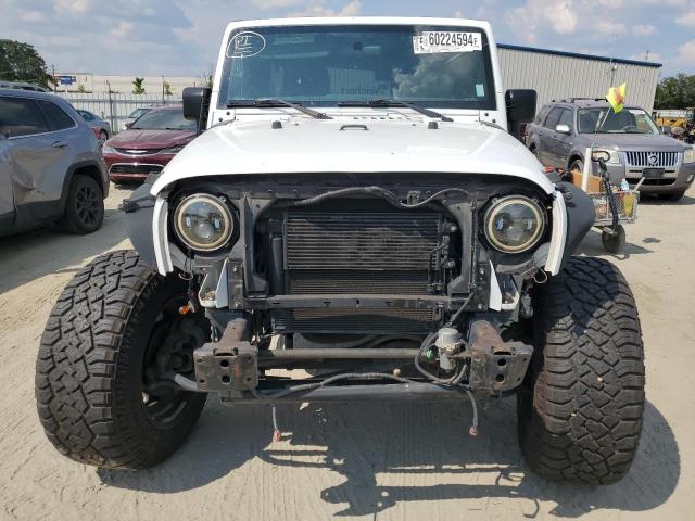 Photo 5 from auction – 2017 JEEP WRANGLER U with VIN 1C4BJWDG9HL665232