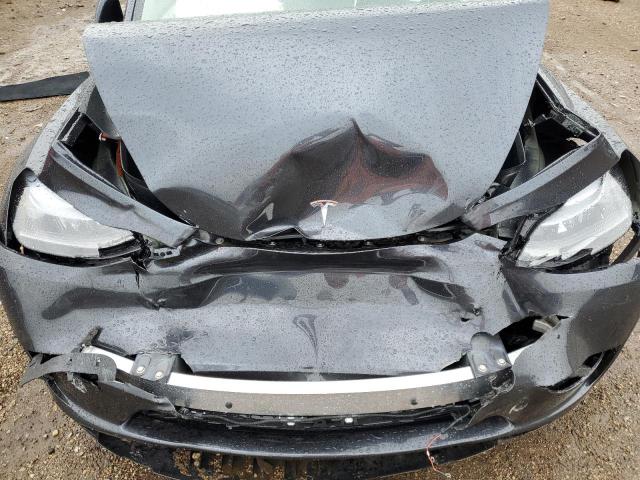 Photo 11 from auction – 2024 TESLA MODEL Y with VIN 7SAYGDEE2RA281808