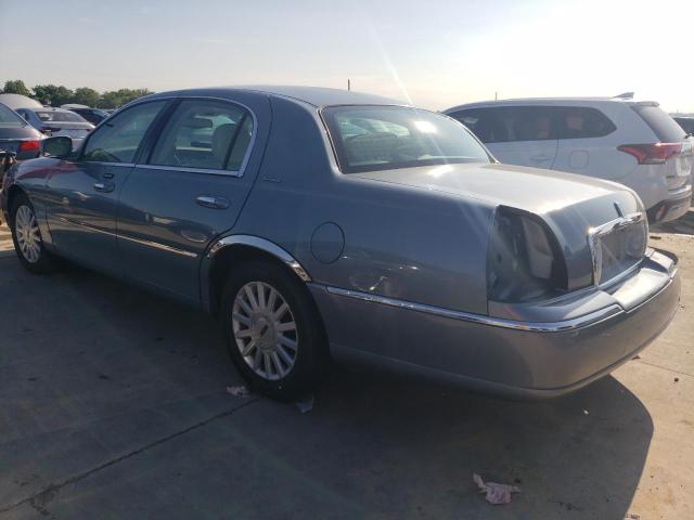 Photo 2 from auction – 2003 LINCOLN TOWN CAR E with VIN 1LNHM81WX3Y682962
