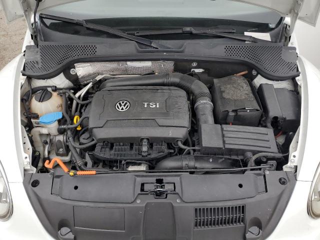 Photo 11 from auction – 2014 VOLKSWAGEN BEETLE with VIN 3VW517AT2EM814527
