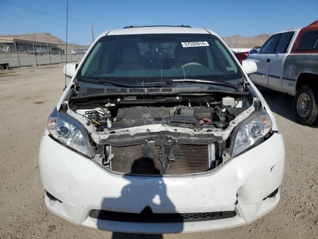 Photo 5 from auction – 2014 TOYOTA SIENNA LE with VIN 5TDKK3DC6ES468425