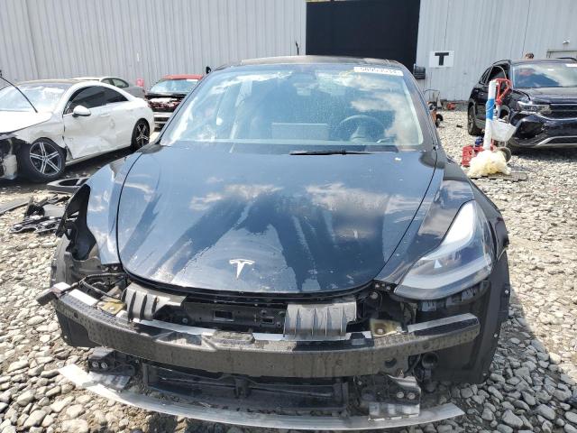 Photo 5 from auction – 2022 TESLA MODEL 3 with VIN 5YJ3E1EB0NF122820