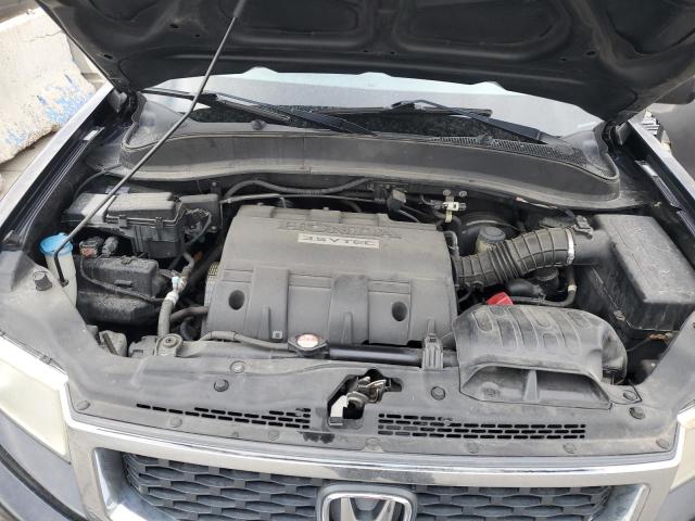 Photo 11 from auction – 2009 HONDA RIDGELINE with VIN 5FPYK16569B106805