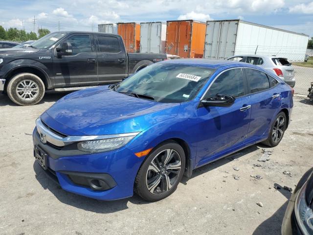 HONDA CIVIC TOUR 2016 with VIN 19XFC1F95GE005337 - Photo from auction