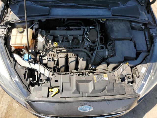 Photo 11 from auction – 2015 FORD FOCUS SE with VIN 1FADP3K28FL319849