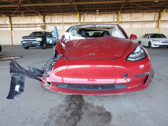 Photo 5 from auction – 2018 TESLA MODEL 3 with VIN 5YJ3E1EA1JF058028