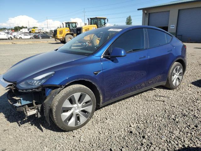TESLA MODEL Y 2023 with VIN 7SAYGDEE2PF585351 - Photo from auction