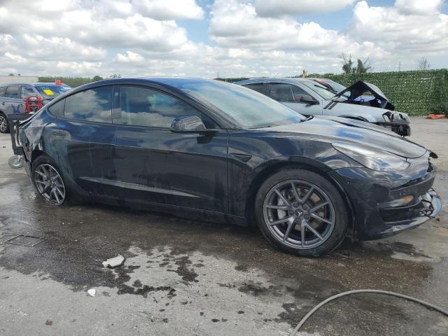 Photo 4 from auction – 2021 TESLA MODEL 3 with VIN 5YJ3E1EB9MF035643
