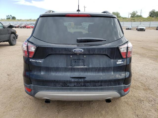 Photo 6 from auction – 2018 FORD ESCAPE SE with VIN 1FMCU9GD2JUC62445