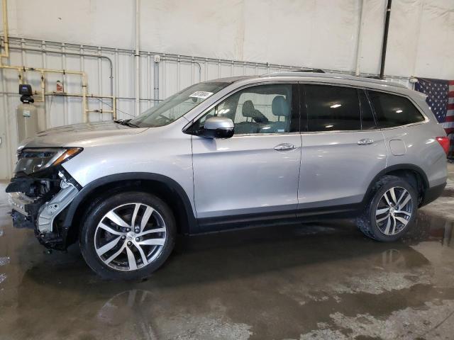 HONDA PILOT ELIT 2017 with VIN 5FNYF6H07HB100859 - Photo from auction