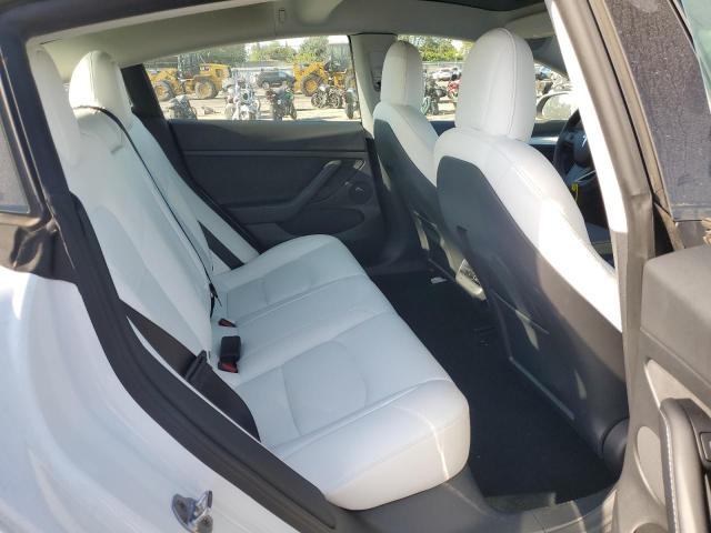 Photo 10 from auction – 2022 TESLA MODEL 3 with VIN 5YJ3E1EB8NF276384