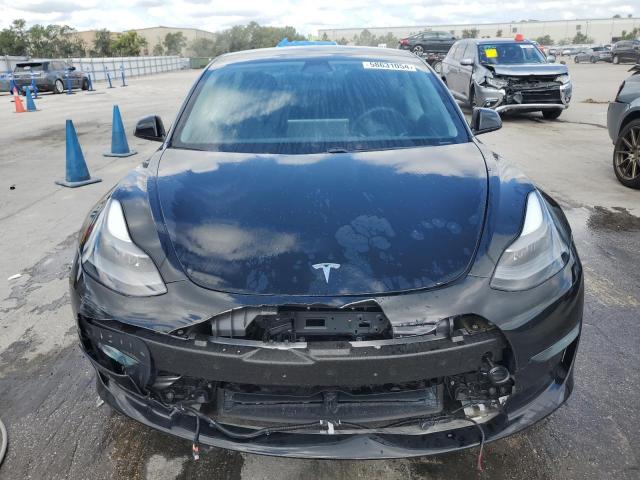 Photo 5 from auction – 2021 TESLA MODEL 3 with VIN 5YJ3E1EB9MF035643
