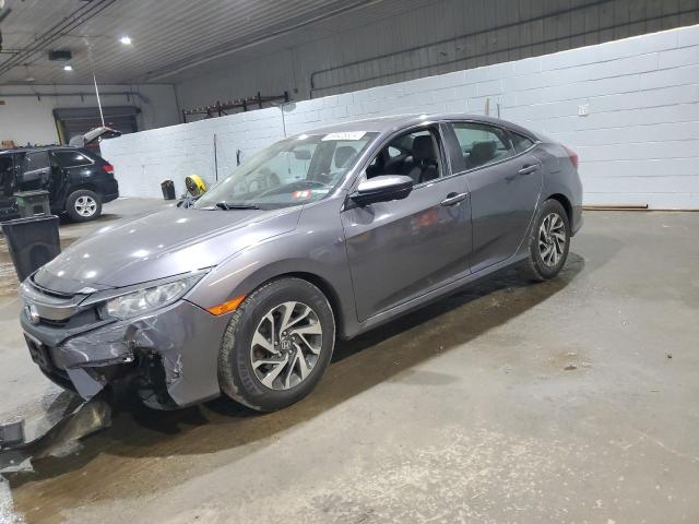 HONDA CIVIC EX 2017 with VIN 2HGFC2F74HH564065 - Photo from auction
