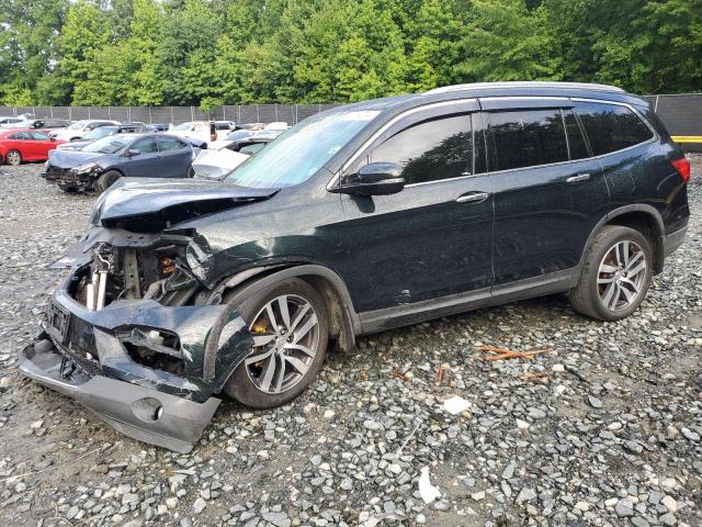HONDA PILOT TOUR 2016 with VIN 5FNYF6H95GB062044 - Photo from auction