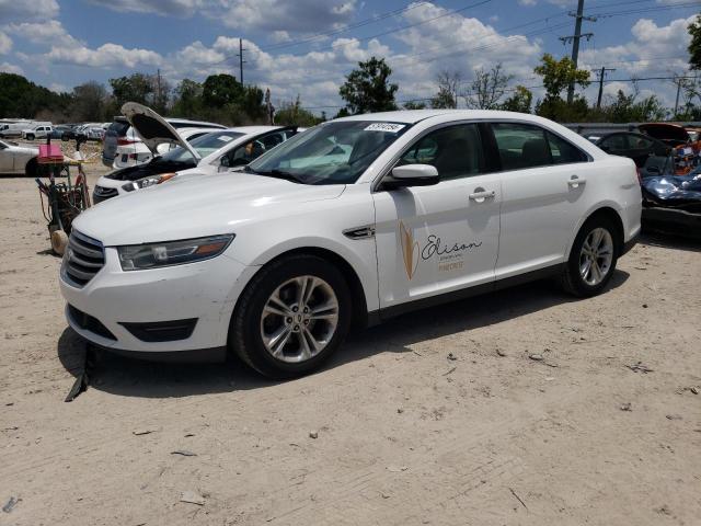 FORD TAURUS SEL 2015 with VIN 1FAHP2E84FG182168 - Photo from auction