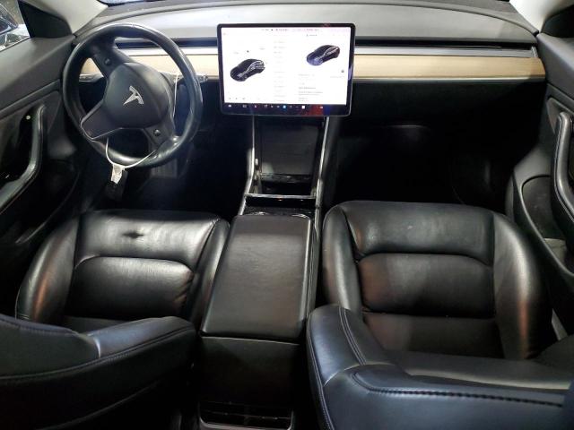 Photo 8 from auction – 2018 TESLA MODEL 3 with VIN 5YJ3E1EB2JF084615