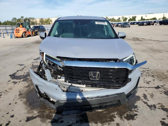Photo 5 from auction – 2023 HONDA RIDGELINE with VIN 5FPYK3F79PB005204