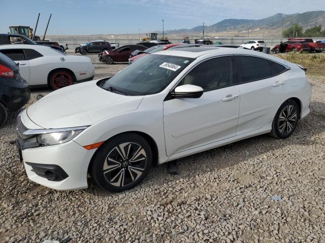 HONDA CIVIC 2018 with VIN JHMFC1F30JX038005 - Photo from auction