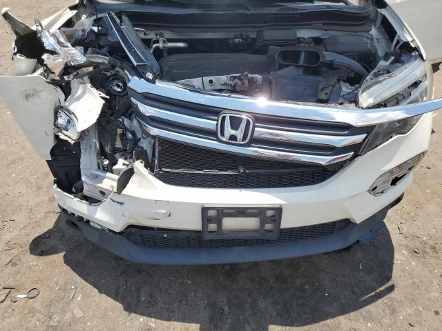 Photo 12 from auction – 2017 HONDA PILOT LX with VIN 5FNYF6H13HB029281