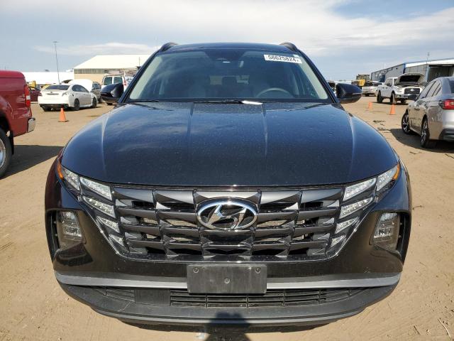 Photo 5 from auction – 2022 HYUNDAI TUCSON SEL with VIN KM8JBCAE9NU024318