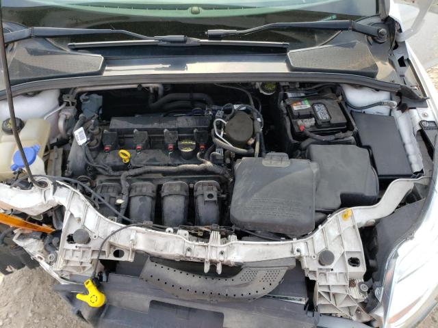 Photo 11 from auction – 2014 FORD FOCUS SE with VIN 1FADP3K29EL335900