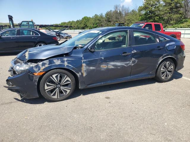 HONDA CIVIC EXL 2018 with VIN JHMFC1F74JX014812 - Photo from auction