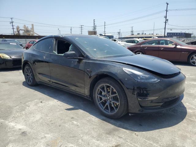 Photo 4 from auction – 2022 TESLA MODEL 3 with VIN 5YJ3E1EAXNF349469