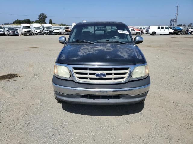 Photo 5 from auction – 2002 FORD F150 with VIN 1FTRX072X2KA60661