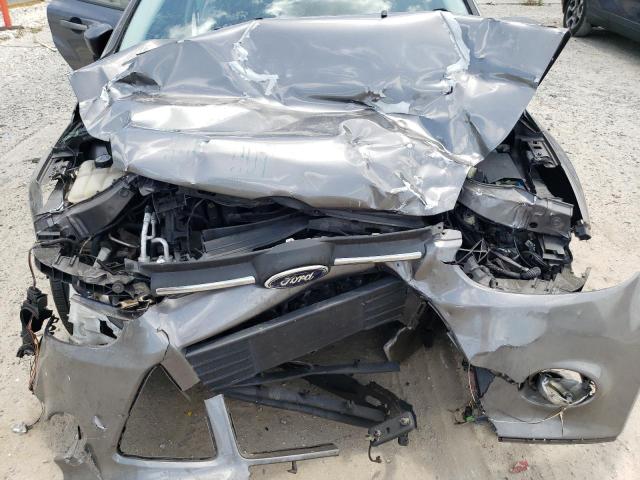 Foto 12 de la subasta – 2012 FORD FOCUS SE con VIN 1FAHP3K23CL473611