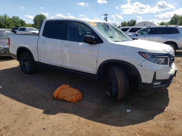 Photo 4 from auction – 2023 HONDA RIDGELINE with VIN 5FPYK3F15PB056663