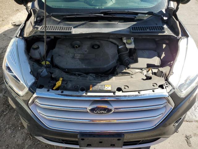 Photo 11 from auction – 2018 FORD ESCAPE TIT with VIN 1FMCU9J94JUC01537