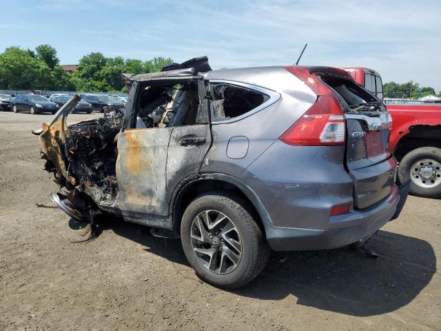 Photo 2 from auction – 2016 HONDA CR-V with VIN 5J6RM4H45GL031130