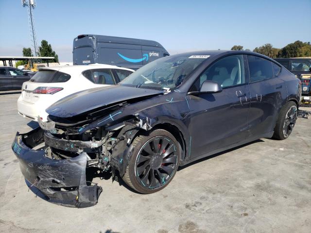 TESLA MODEL Y 2022 with VIN 7SAYGDEF2NF411284 - Photo from auction