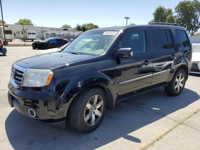HONDA PILOT TOUR 2015 with VIN 5FNYF3H95FB012712 - Photo from auction