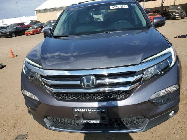 Photo 5 from auction – 2018 HONDA PILOT TOUR with VIN 5FNYF6H96JB069558