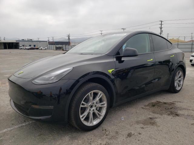 TESLA MODEL Y 2024 with VIN 7SAYGDED7RF039526 - Photo from auction