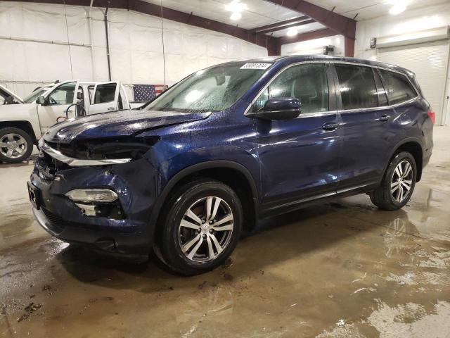 HONDA PILOT EXL 2018 with VIN 5FNYF6H52JB025893 - Photo from auction