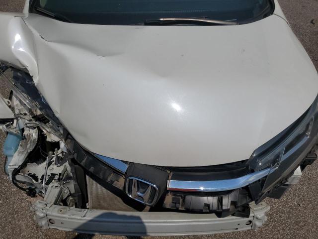 Photo 12 from auction – 2016 HONDA CR-V SE with VIN 5J6RM4H41GL063296