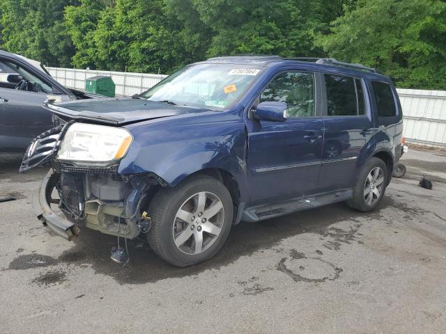 HONDA PILOT TOUR 2013 with VIN 5FNYF4H99DB023277 - Photo from auction