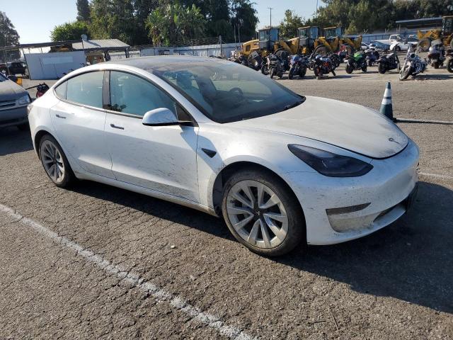 Photo 4 from auction – 2022 TESLA MODEL 3 with VIN 5YJ3E1EB8NF276384